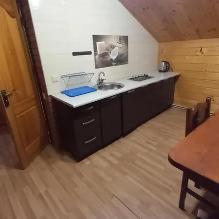 בית נופש між тростяном та рікою